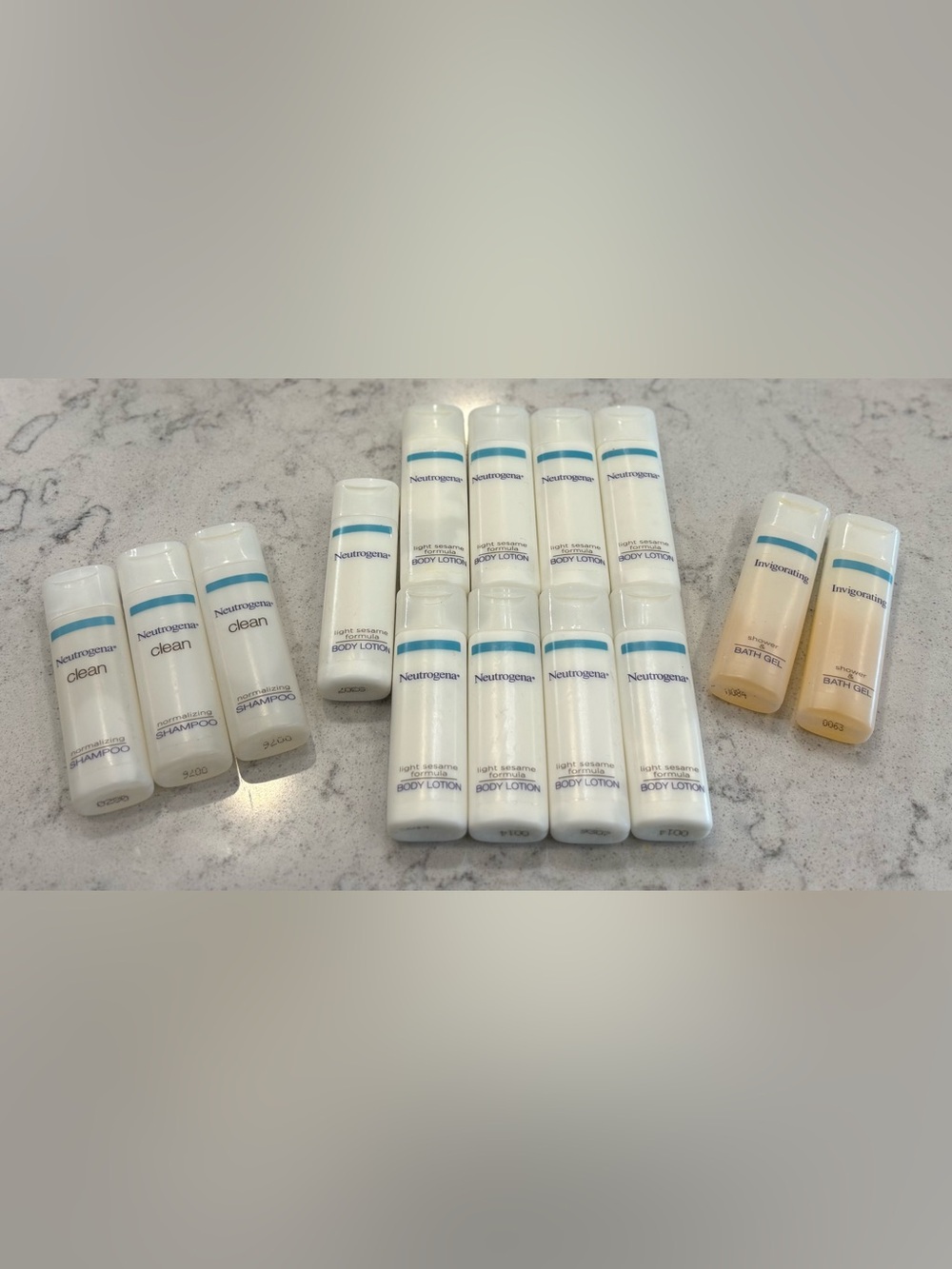 Neutrogena set of 14 Travel size Body care bottles